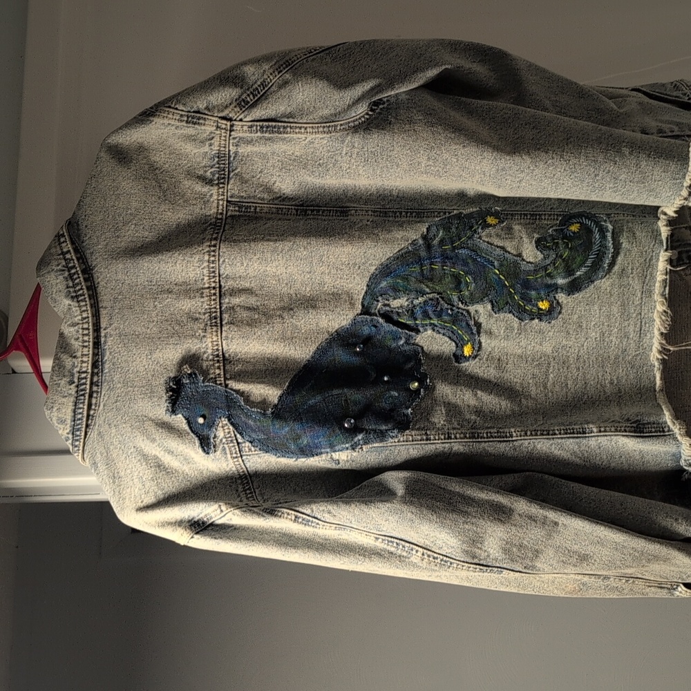 Cato Distressed Light Blue Jean Jacket. Peacock Applique On Back.
